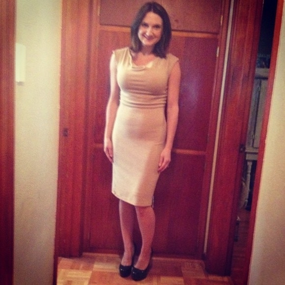 Sleeveless cowl neck dress.