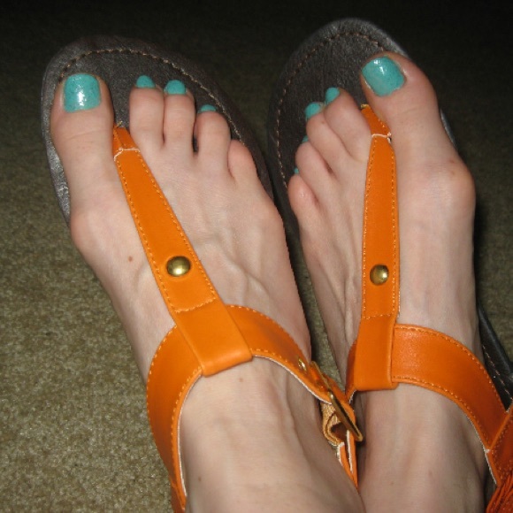 Orange sandals.