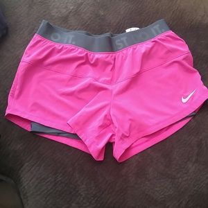 Pink Nike dri-fit shorts