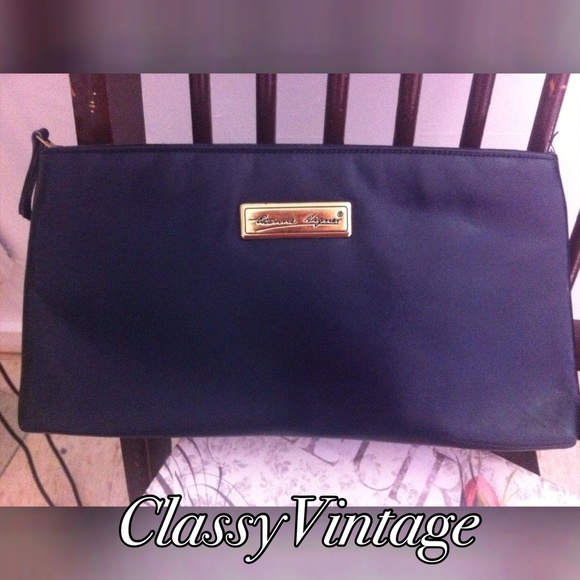 Etienne Aigner Handbags - VINTAGE Etienne Aigner leather clutch