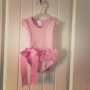 Designer baby girl onesie by Mud Pie.