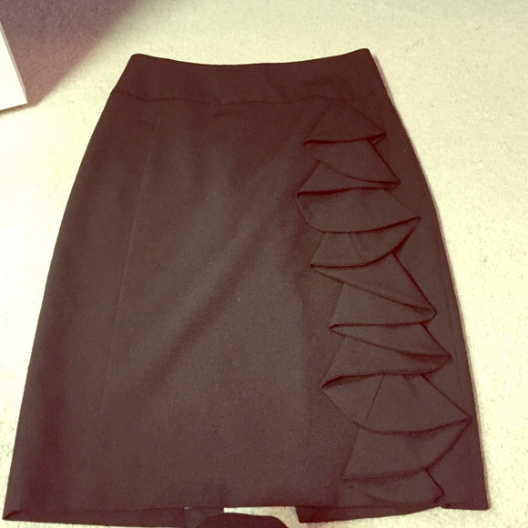 Knee length skirt w/ ruffle and cheetah lining
