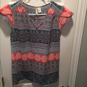 Pretty blouse in bright spring colors. NWOT
