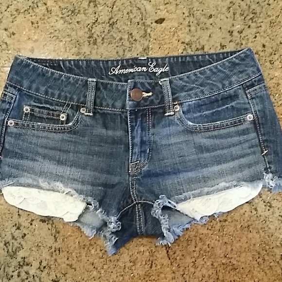 American Eagle jean shorts with crochet pockets