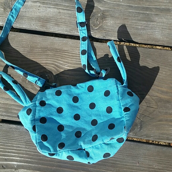 Black and black polka dot bag