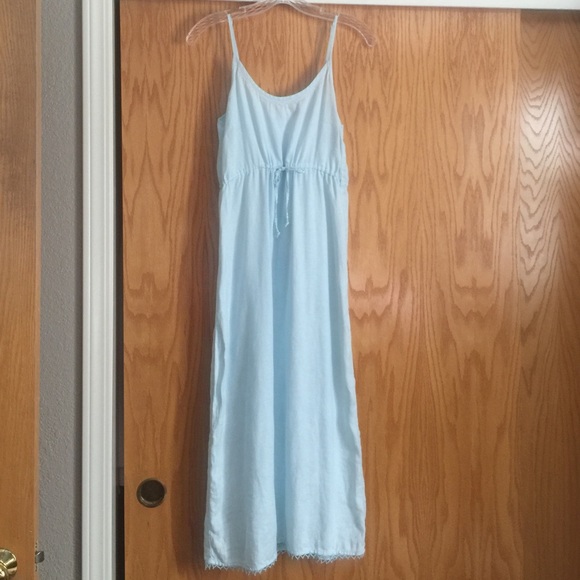 Cute summer linen maxi dress with fun details.