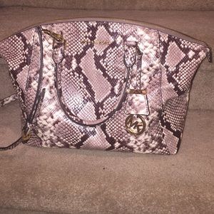 Auth.  Michael Kors Large Riley embossed leather