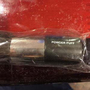 Younique powder puff brush.
