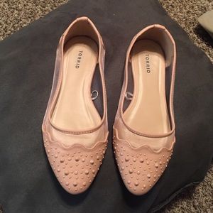 Blush colored flats