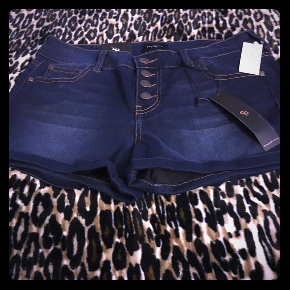 Dark denim shorts. Size 9.