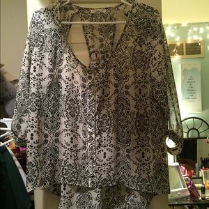 Sheer cream and navy blouse