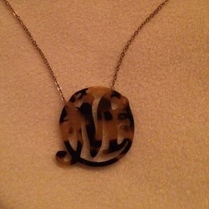 Tortoise shell, monogrammed "M" necklace