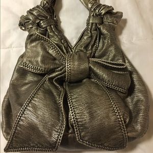 UNIQUE silver purse with large Bow on front