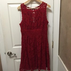 Never worn. Vibrant red!