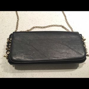 Black vegan leather clutch with studding