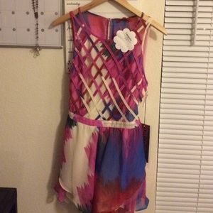 Never worn beautiful romper.