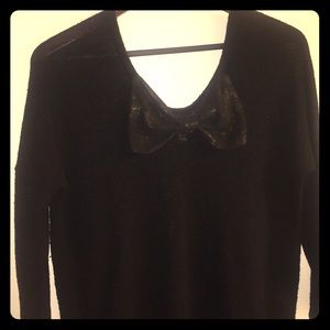 Scoop neck sweater w/bow across shoulders