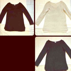 Three sweater tunics. Green, beige, and black