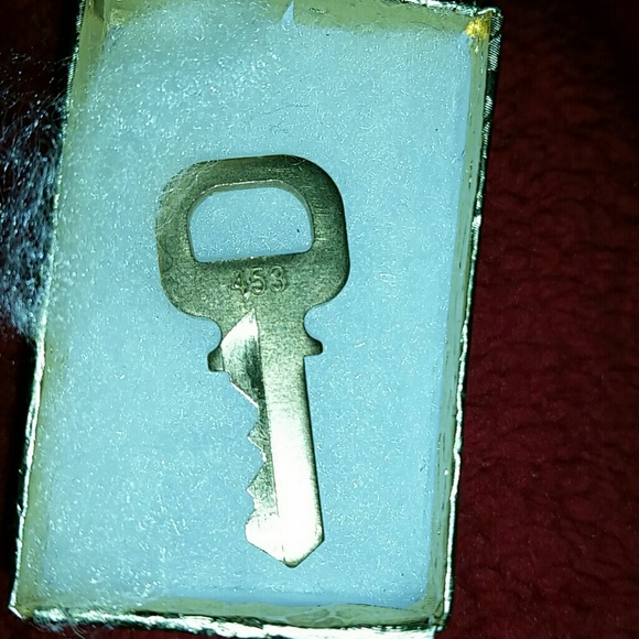 Authentic Louis Vuitton Gold Lock Key