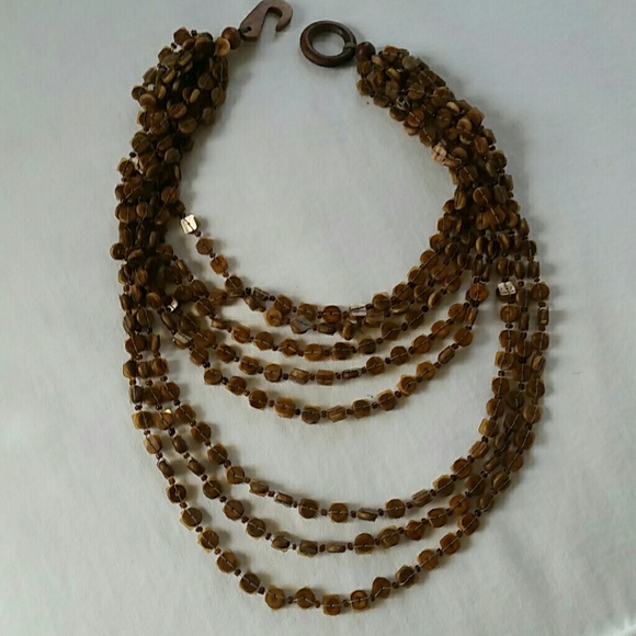 Shiny wood and clear bead necklace