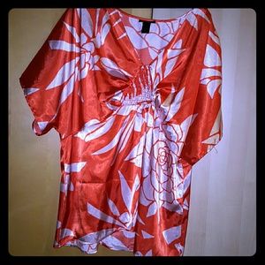 Silky orange and white tunic.