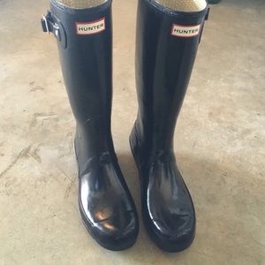 Black glossy tall hunter boots
