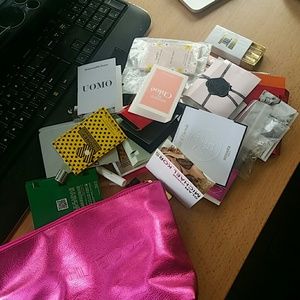 Shiseido makeup bag with a lot of fragrance sample