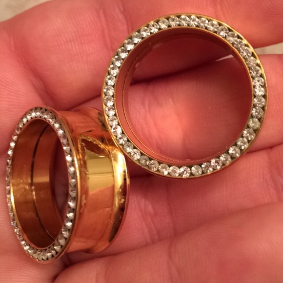 1 inch Gold plugs.