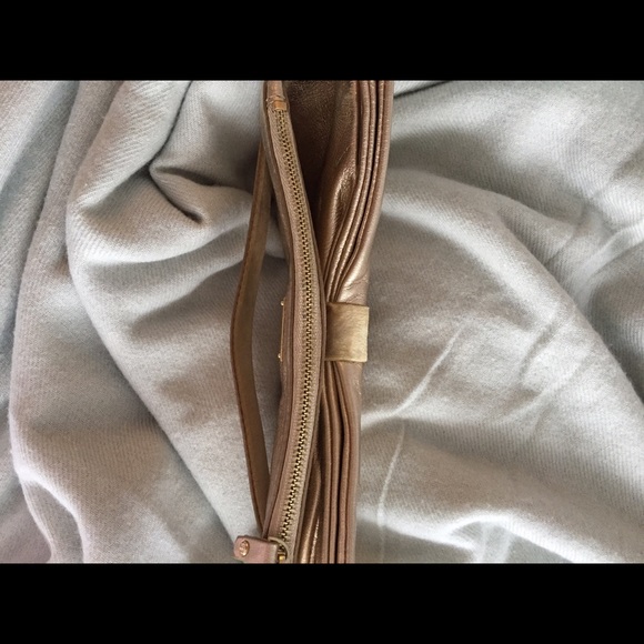 Kate spade Gold leather clutch with big cute bow