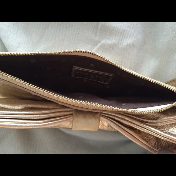 Kate spade Gold leather clutch with big cute bow
