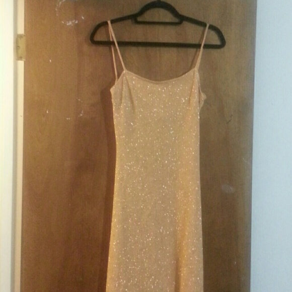 Alexia Admor floor length gold dress.