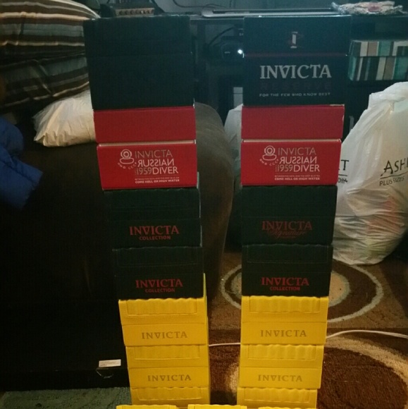 Assorted Invicta watch cases