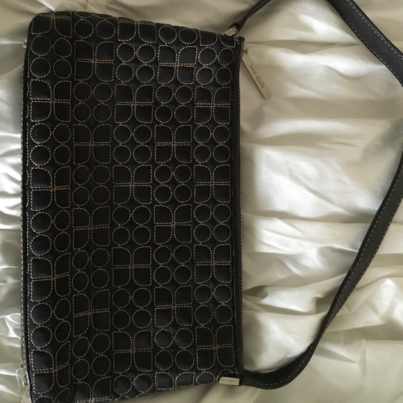Authentic black and cream Kate Spade clutch