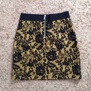 Black and yellow mini skirt