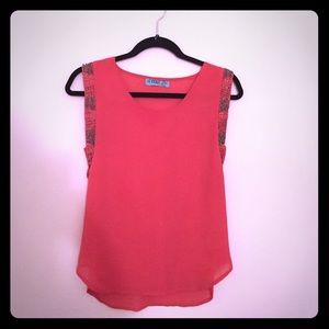 Salmon-pink top with beading on sleeves