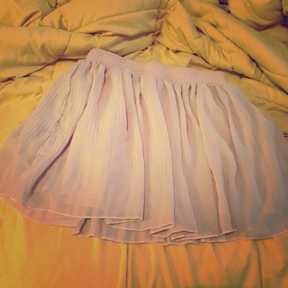 Fun and flirty light pink skirt.