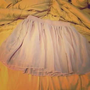 Fun and flirty light pink skirt.