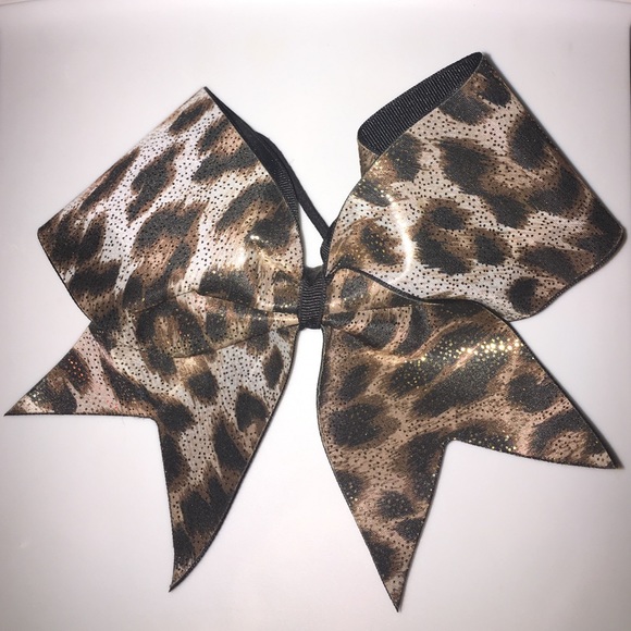 Cheetah cheer bow with gold sparkles
