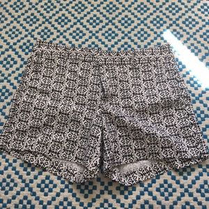 Navy and white print shorts.