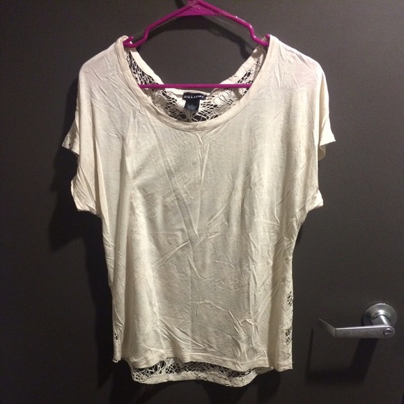 Cream shirt sleeve shirt with a lace back