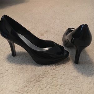 Cute black heels, slightly worn.