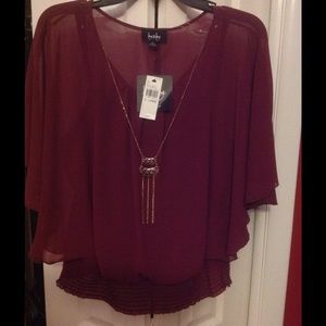Elegant burgundy blouse with attached necklace