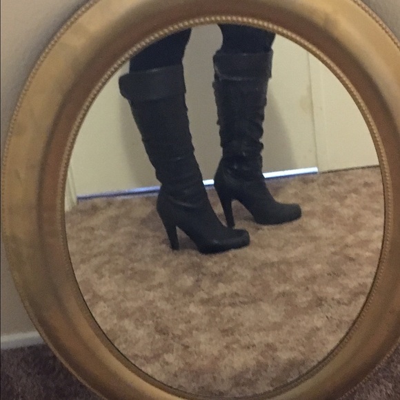Black leather high heel boots