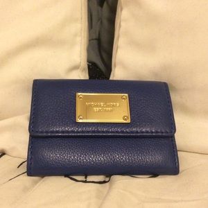 Small navy and gold wallet