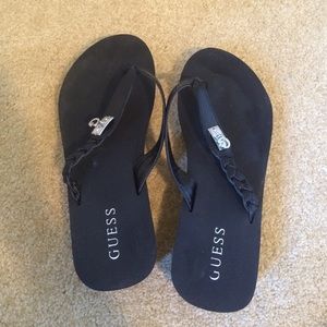 Guess black platform flip flops. Good condition
