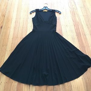 Black pleated Marilyn-Monroe-esque dress
