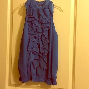 Sleeveless blue top with ruffle front