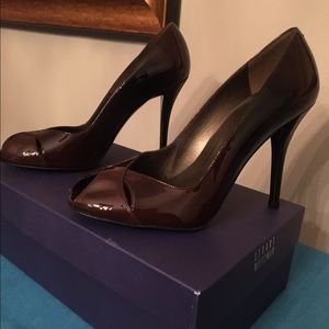 Stuart Weitzman 8M patent leather peep toe heels.