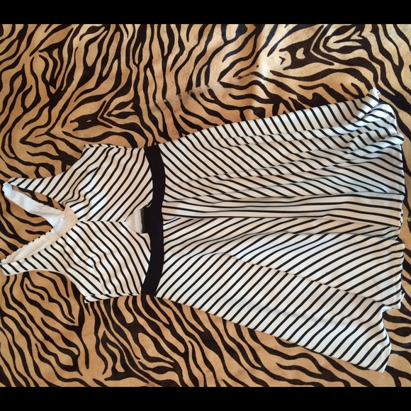 No stains. Smoke free. Barely worn.