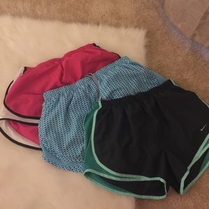 3 pairs of Nike running shorts